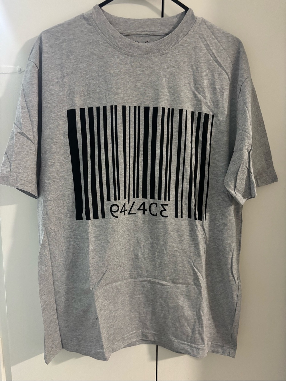 Worn once PALACE Light Gray Tee with Black Barcode Graphic